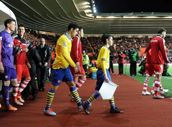 Mikel Arteta (Arsenal) with the mascot. Southampton 2: 2 Arsenal. Barclays Premier League