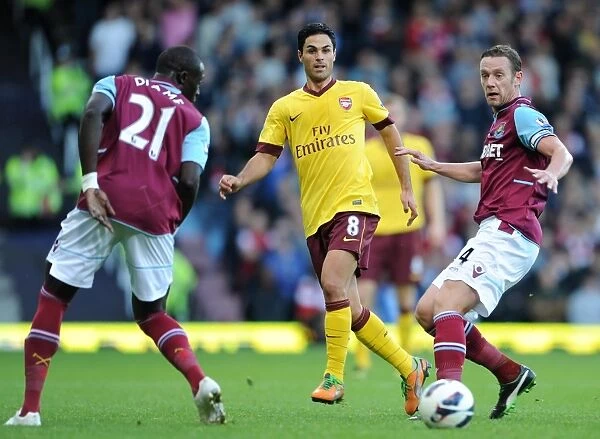 Mikel Arteta (Arsenal) Mohamed Diame and Kevin Nolan (West Ham). West Ham United 1: 3 Arsenal