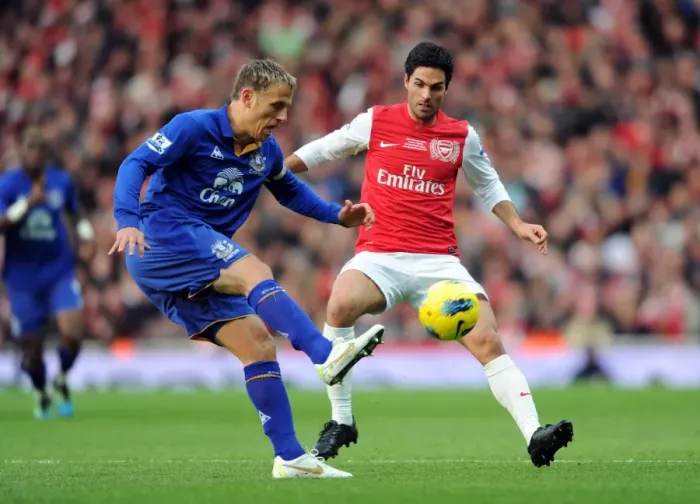 Framed Print : Mikel Arteta (Arsenal) Philip Neville (Everton). Arsenal 1: 0 Everton. Barclays Premier League Framed Print : Mikel Arteta (Arsenal) Philip Neville (Everton). Arsenal 1: 0 Everton. Barclays Premier League