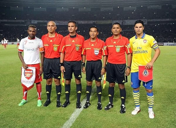 Mikel Arteta and Boaz Solossa Clash in Arsenal vs. Indonesia All-Stars Match, 2013