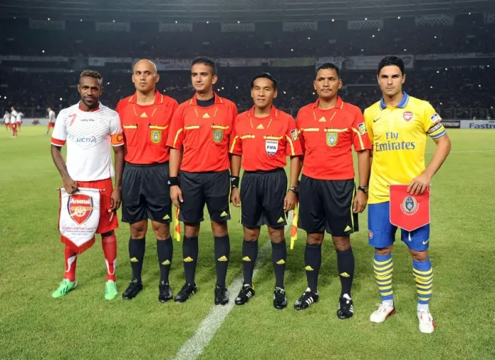 Framed Print : Mikel Arteta and Boaz Solossa Clash in Arsenal vs. Indonesia All-Stars Match, 2013 Framed Print : Mikel Arteta and Boaz Solossa Clash in Arsenal vs. Indonesia All-Stars Match, 2013