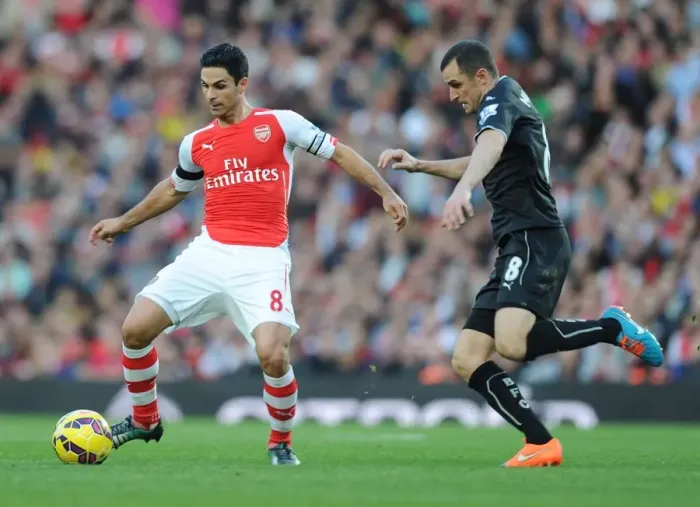 Framed Print : Mikel Arteta Breaks Past Burnley's Dean Marney in Arsenal's Premier League Clash (Arsenal v Burnley 2014 / 15) Framed Print : Mikel Arteta Breaks Past Burnley's Dean Marney in Arsenal's Premier League Clash (Arsenal v Burnley 2014 / 15)