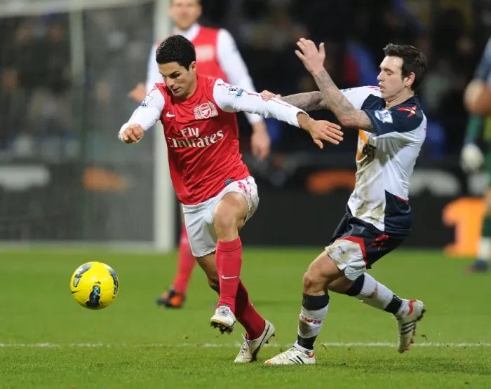 Framed Print : Mikel Arteta Breaks Past Mark Davies: Bolton Wanderers vs. Arsenal, Premier League 2011-12