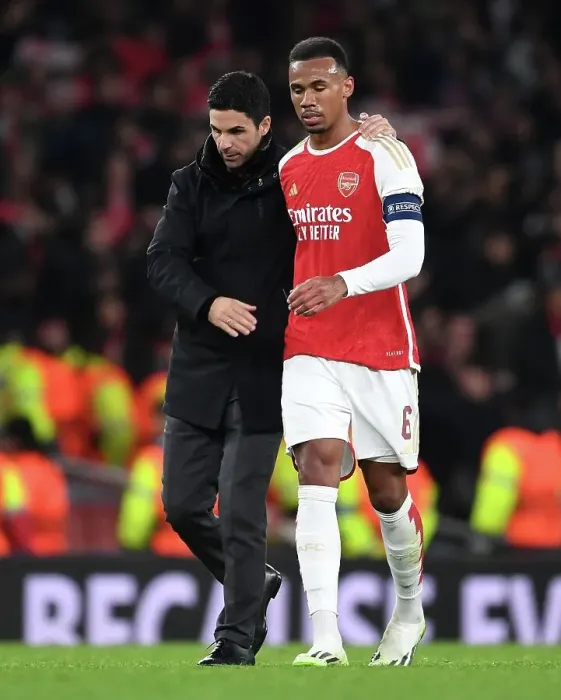 Framed Print : Mikel Arteta Comforts Gabriel: A Moment of Tranquility Amidst Arsenal's UEFA Champions League Turmoil (Arsenal vs Sevilla, 2023 / 24)