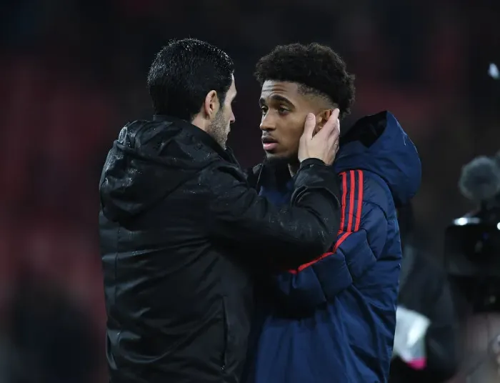 Framed Print : Mikel Arteta Comforts Reiss Nelson: A Moment of Consolation after AFC Bournemouth vs Arsenal (Premier League 2019-20) Framed Print : Mikel Arteta Comforts Reiss Nelson: A Moment of Consolation after AFC Bournemouth vs Arsenal (Premier League 2019-20)