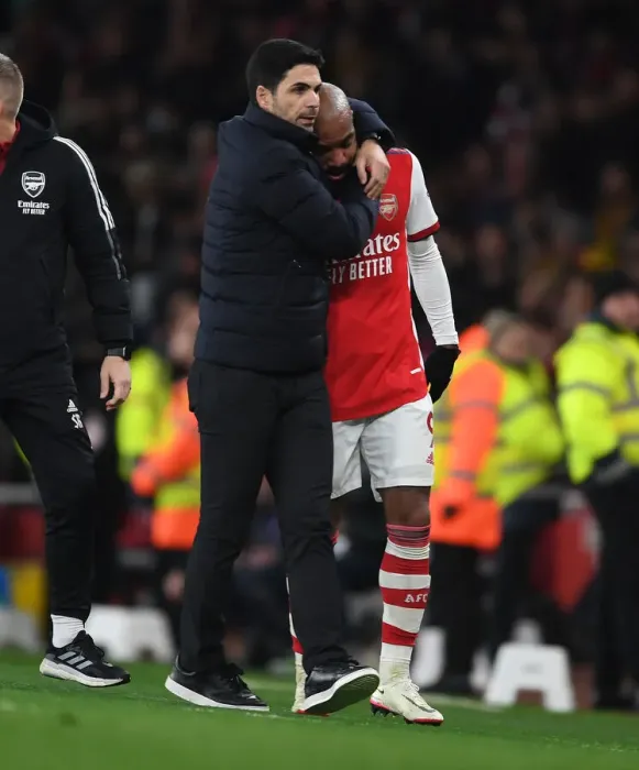 Framed Print : Mikel Arteta Comforts Substituted Alexis Lacazette: An Emotional Moment at Arsenal vs West Ham United