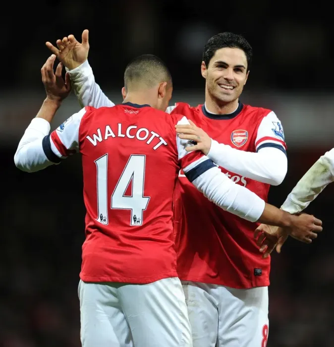 Framed Print : Mikel Arteta congratulates Theo Walcott (Arsenal) on his cross for Olivier Girouds 1st goal Framed Print : Mikel Arteta congratulates Theo Walcott (Arsenal) on his cross for Olivier Girouds 1st goal