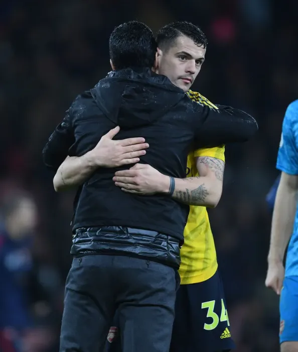 Framed Print : Mikel Arteta Consoles Distressed Granit Xhaka: A Moment of Comfort After Arsenal's Win at Bournemouth