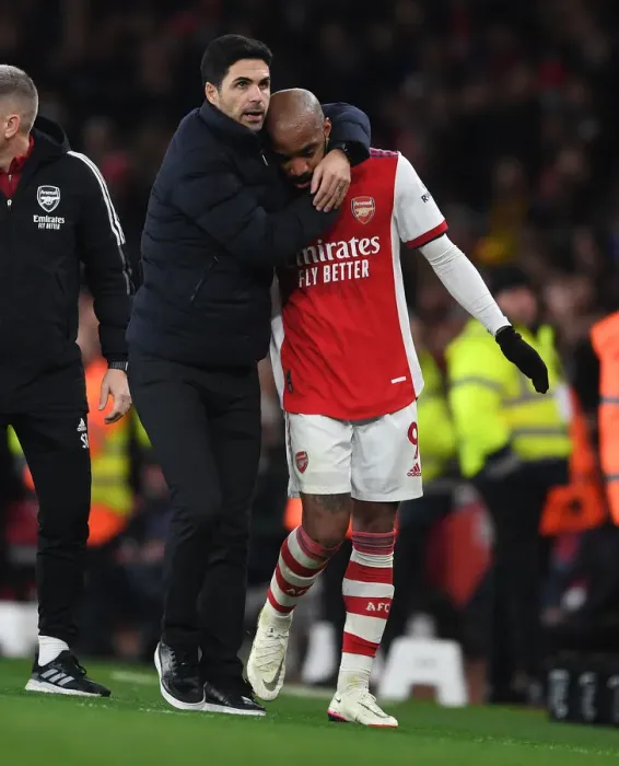 Framed Print : Mikel Arteta Consoles Emotional Alexis Lacazette: A Heartfelt Moment at Arsenal vs West Ham United