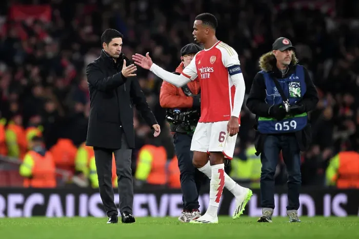 Framed Print : Mikel Arteta Consoles Gabriel: A Moment of Peace Amidst Arsenal's UEFA Champions League Struggle (Arsenal vs Sevilla, 2023 / 24)