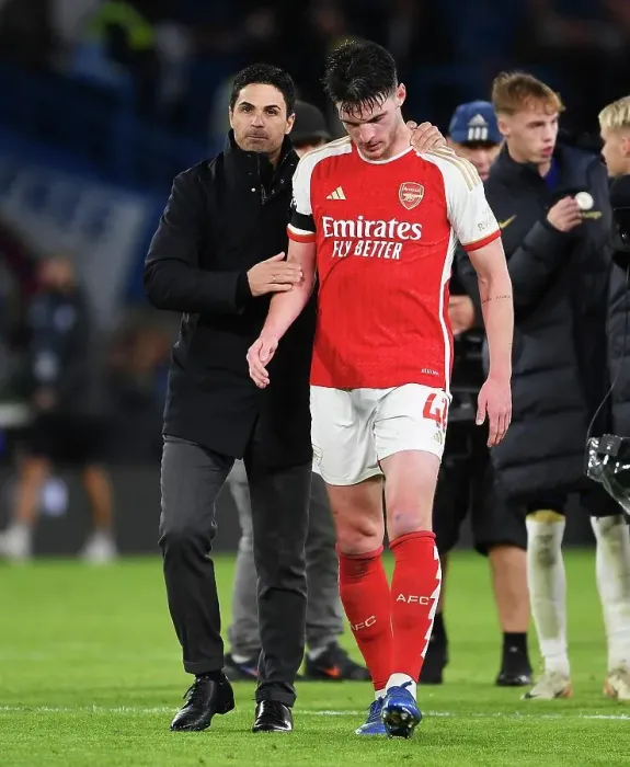 Framed Print : Mikel Arteta and Declan Rice: A Moment of Sportsmanship Amidst Chelsea vs. Arsenal Rivalry (2023-24)