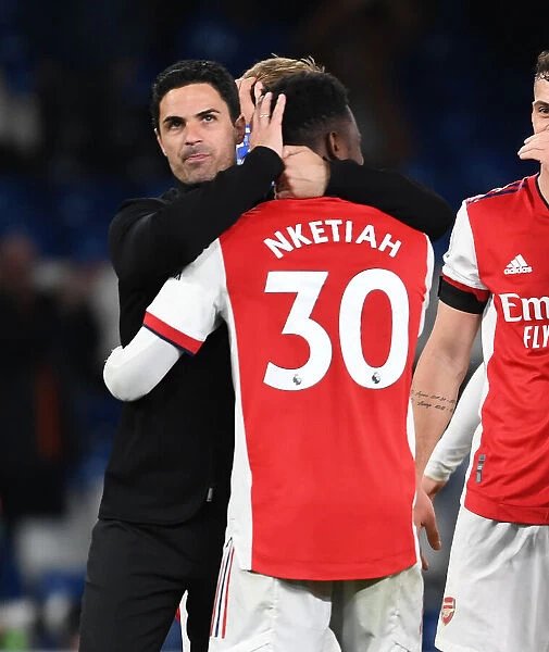 Mikel Arteta and Eddie Nketiah Celebrate Arsenal's Win at Chelsea (April 2022)