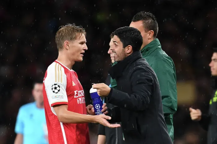 Framed Print : Mikel Arteta Guides Odegaard: Arsenal's Tactical Masterclass vs PSV Eindhoven, UEFA Champions League 2023-24 Framed Print : Mikel Arteta Guides Odegaard: Arsenal's Tactical Masterclass vs PSV Eindhoven, UEFA Champions League 2023-24