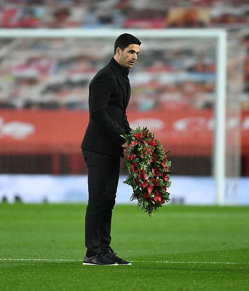 Mikel Arteta Honors Remembrance Day at Empty Old Trafford: Arsenal Manager Pays Tribute During Manchester United vs. Arsenal (2020-21)