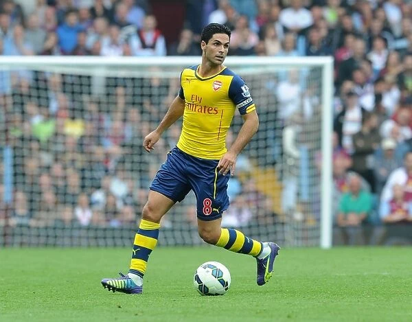Mikel Arteta Leads Arsenal Against Aston Villa in Premier League (2014-15)