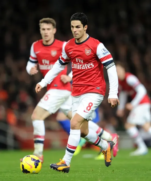 Framed Print : Mikel Arteta Leads Arsenal Against Everton in Premier League Showdown (2013-14) Framed Print : Mikel Arteta Leads Arsenal Against Everton in Premier League Showdown (2013-14)