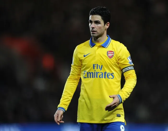 Framed Print : Mikel Arteta Leads Arsenal Against Southampton in Premier League Clash (2013-14) Framed Print : Mikel Arteta Leads Arsenal Against Southampton in Premier League Clash (2013-14)