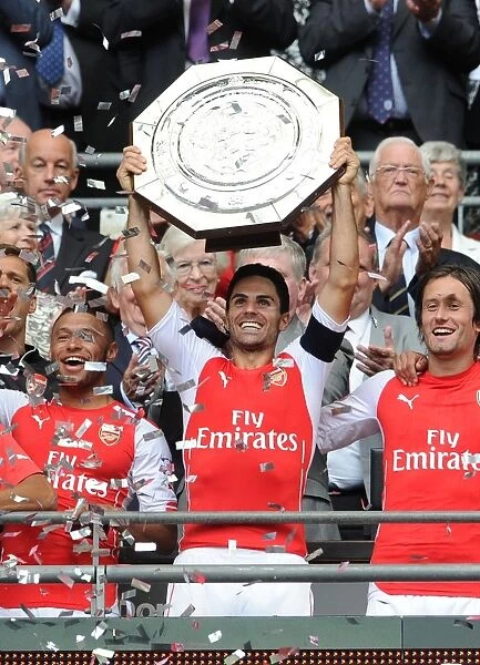 Mikel Arteta Lifts FA Community Shield for Arsenal after Manchester City Victory, 2014