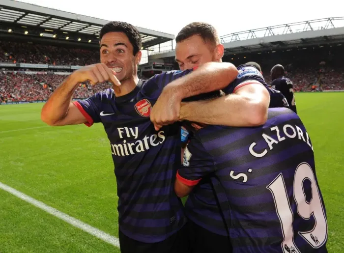 Framed Print : Mikel Arteta and Santi Cazorla: Unforgettable Moment of Arsenal's Victory at Anfield (2012-13) Framed Print : Mikel Arteta and Santi Cazorla: Unforgettable Moment of Arsenal's Victory at Anfield (2012-13)