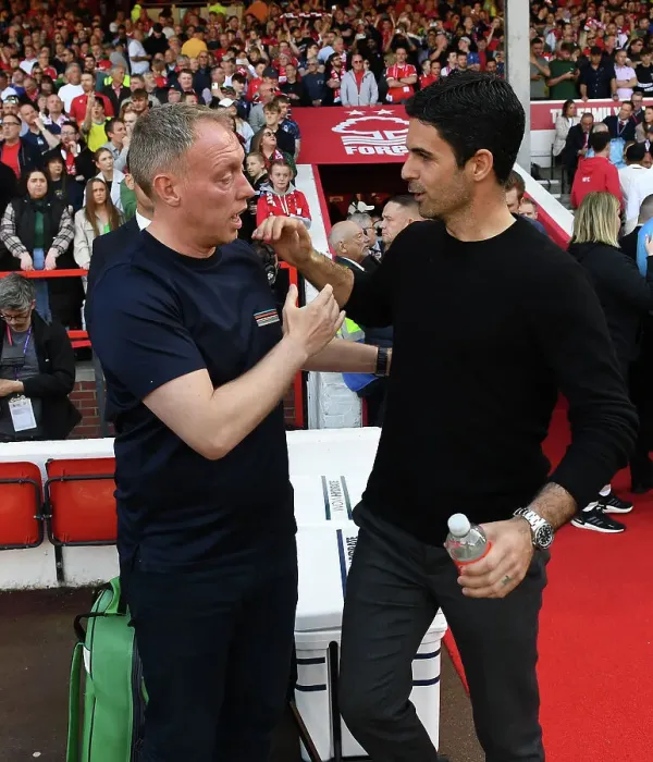 Framed Print : Mikel Arteta and Steve Cooper Embrace Ahead of Nottingham Forest vs. Arsenal Premier League Clash (2022-2023)