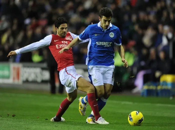 Framed Print : Mikel Arteta Tackles Jordi Gomez: Wigan Athletic vs Arsenal, Premier League 2011-12 Framed Print : Mikel Arteta Tackles Jordi Gomez: Wigan Athletic vs Arsenal, Premier League 2011-12