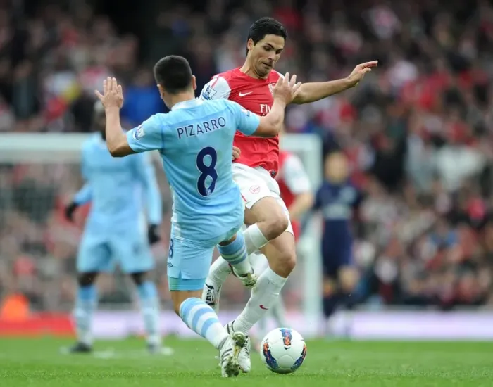 Framed Print : Mikel Arteta takes the ball off David Pizzaro (Man City) before scoring Arsenals goal Framed Print : Mikel Arteta takes the ball off David Pizzaro (Man City) before scoring Arsenals goal