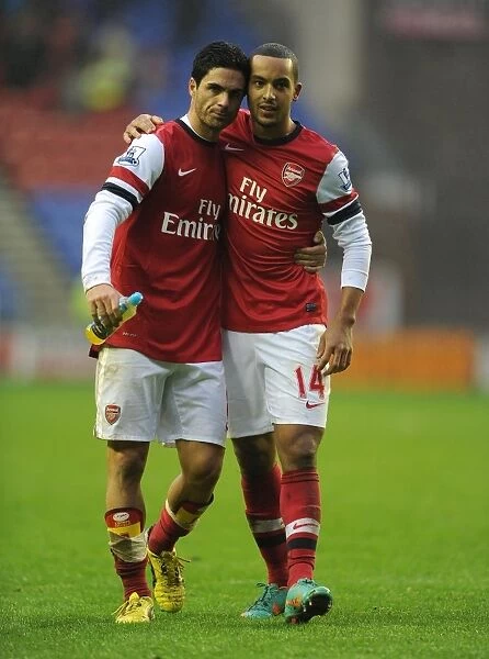 Mikel Arteta and Theo Walcott Celebrate Arsenal's Victory over Wigan Athletic (2012-13)