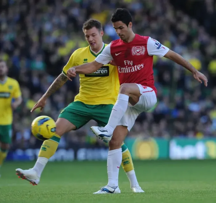 Framed Print : Mikel Arteta vs. Anthony Pilkington: Clash at Carrow Road - Premier League, Norwich City vs. Arsenal (19 / 11 / 11)