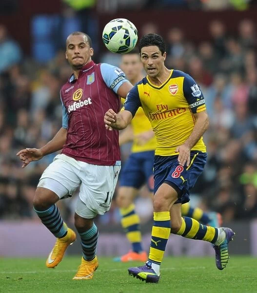 Mikel Arteta vs. Gabby Agbonlahor: Intense Battle in Aston Villa vs. Arsenal Premier League Clash