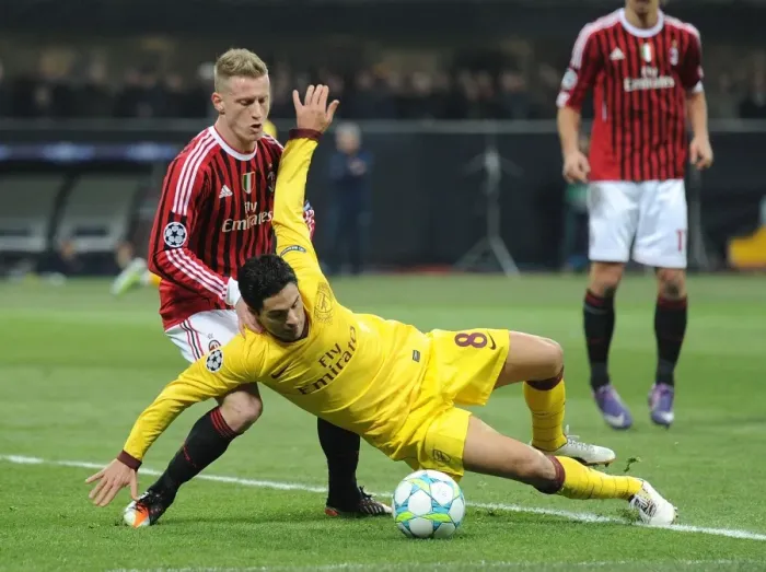 Framed Print : Mikel Arteta vs Ignazio Abate: Clash in the UEFA Champions League