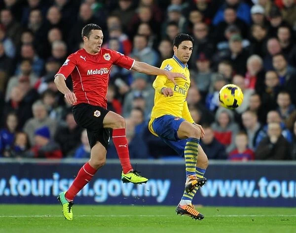 Mikel Arteta vs Jordan Mutch: Intense Clash in Cardiff City vs Arsenal, Premier League 2013-14