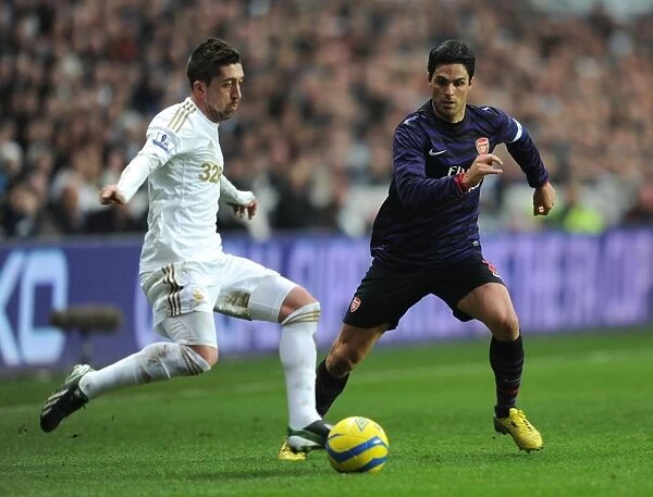 Mikel Arteta vs. Pablo Hernandez: Clash at the Liberty Stadium - Swansea v Arsenal, FA Cup 3rd Round