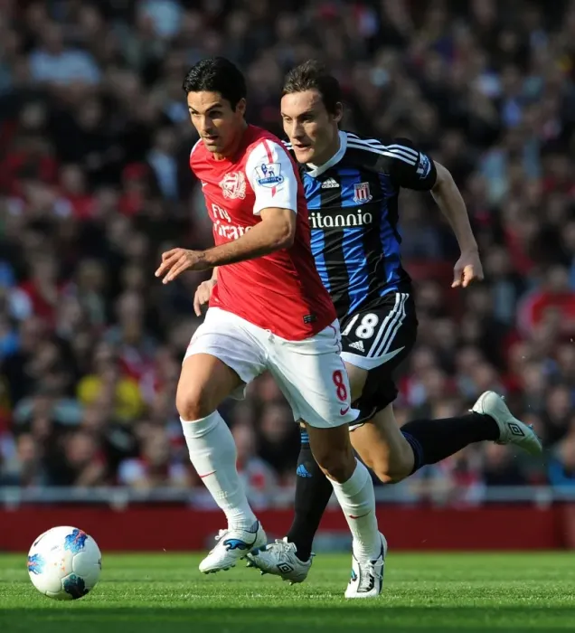 Framed Print : Mikel Arteta's Goal Seals 3-1 Arsenal Victory over Stoke City (2011)