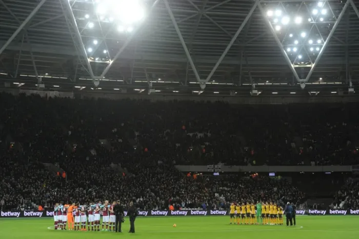 Framed Print : Minutes of Silence: Arsenal and West Ham Honor Chapecoense