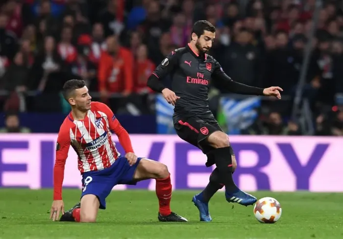 Framed Print : Mkhitaryan Evades Hernandez: Intense Moment from Arsenal's Europa League Semi-Final Clash with Atletico Madrid Framed Print : Mkhitaryan Evades Hernandez: Intense Moment from Arsenal's Europa League Semi-Final Clash with Atletico Madrid