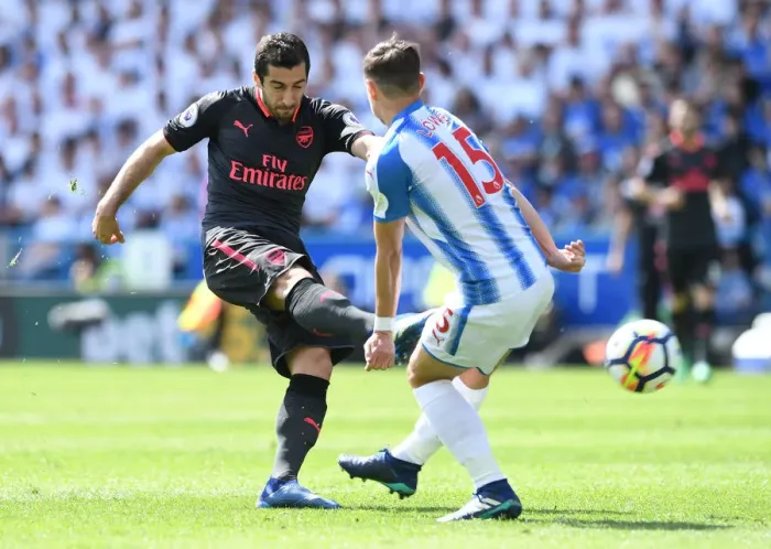 Framed Print : Mkhitaryan Faces Off Against Lowe: Huddersfield vs Arsenal, Premier League Showdown