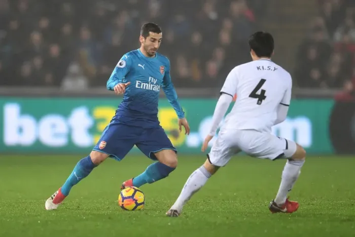 Framed Print : Mkhitaryan vs. Ki: A Premier League Battle at Swansea Framed Print : Mkhitaryan vs. Ki: A Premier League Battle at Swansea