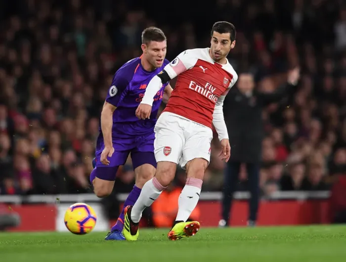 Framed Print : Mkhitaryan vs Milner: A Footballing Battle in the Arsenal vs Liverpool Rivalry Framed Print : Mkhitaryan vs Milner: A Footballing Battle in the Arsenal vs Liverpool Rivalry