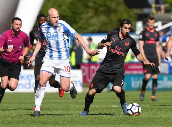 Framed Print : Mkhitaryan vs Mooy: Intense Battle in Huddersfield Town vs Arsenal Premier League Clash Framed Print : Mkhitaryan vs Mooy: Intense Battle in Huddersfield Town vs Arsenal Premier League Clash