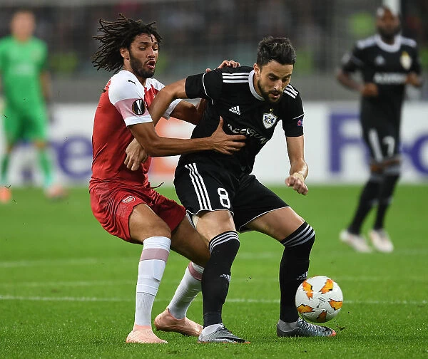 Mo Elneny vs Micel: Intense Clash in Qarabag v Arsenal UEFA Europa League Match