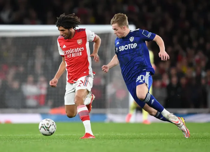 Framed Print : Mo Elneny's Slick Moves: Outsmarting Leeds Joe Gelhardt in Arsenal's Carabao Cup Victory