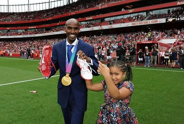 Mo Farah, Arsenal Supporter and 5000m World Champion, Celebrates Victory at Emirates Stadium as Arsenal Triumphs Over Swansea City