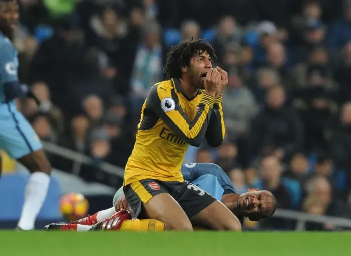 Framed Print : Mohamed Elneny of Arsenal Faces Off Against Manchester City in Premier League Clash (2016-17)