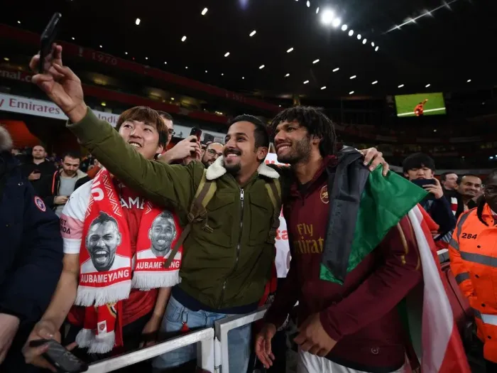 Framed Print : Mohamed Elneny (arsenal) meets an Eygtpian fan