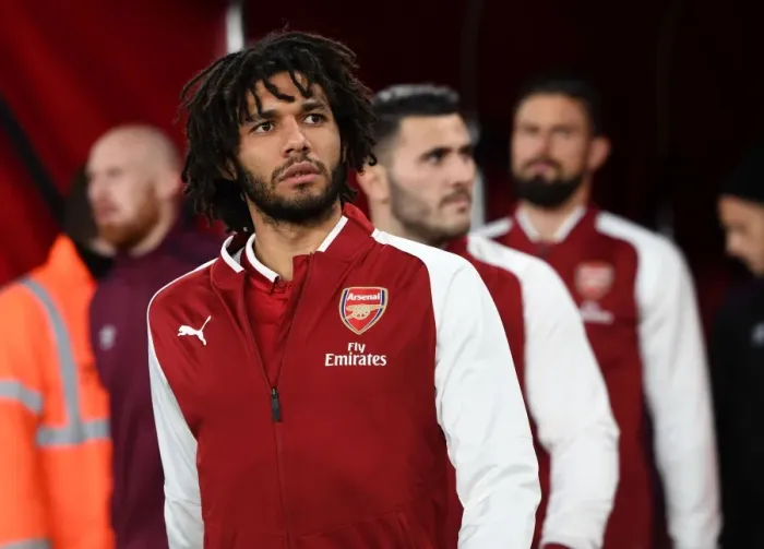 Framed Print : Mohamed Elneny: Arsenal's Focused Pre-Match Moment at Carabao Cup Quarterfinal vs West Ham United Framed Print : Mohamed Elneny: Arsenal's Focused Pre-Match Moment at Carabao Cup Quarterfinal vs West Ham United