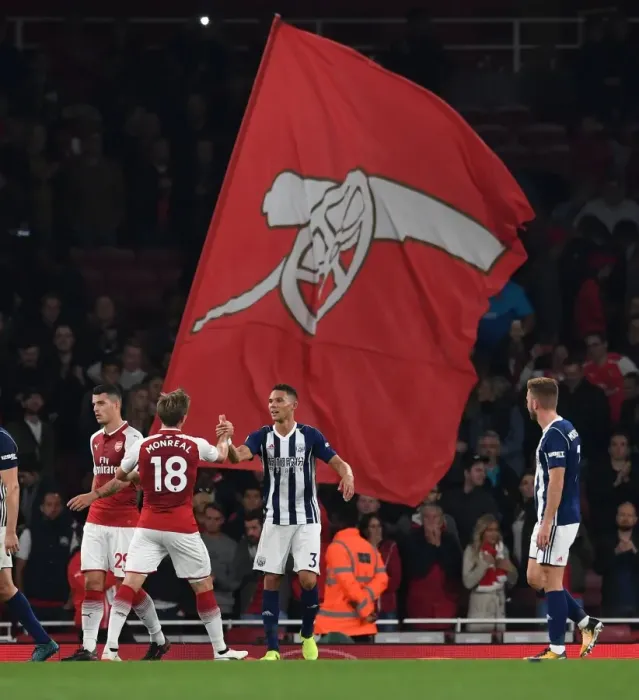 Framed Print : Monreal and Gibbs Share a Moment after Arsenal vs. West Brom Match