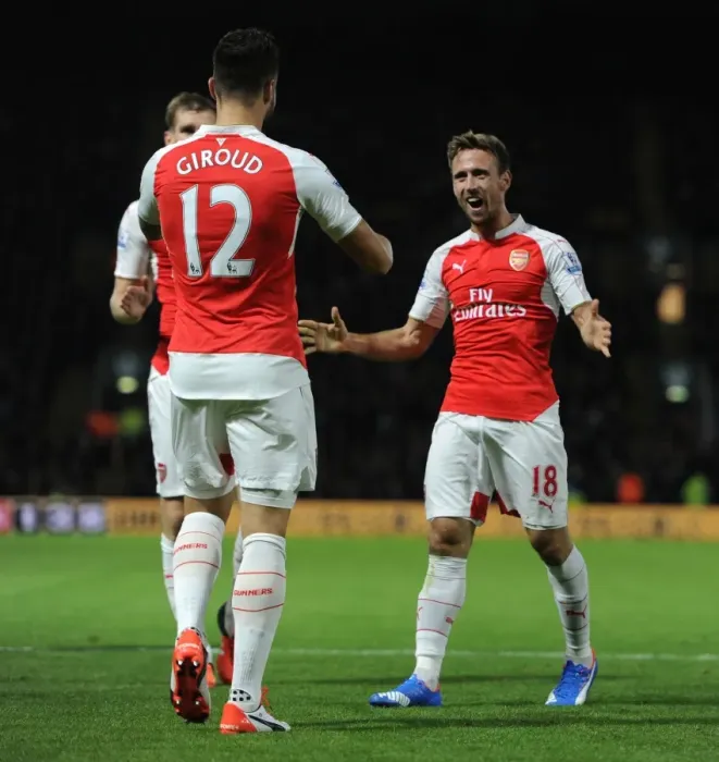 Framed Print : Monreal and Giroud: Arsenal's Unforgettable Goal Celebration vs. Watford (2015 / 16) Framed Print : Monreal and Giroud: Arsenal's Unforgettable Goal Celebration vs. Watford (2015 / 16)