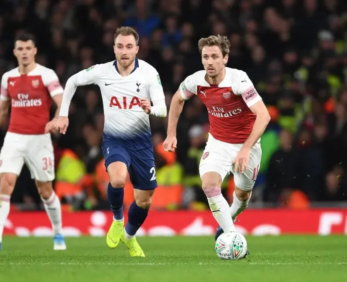 Framed Print : Monreal Outmaneuvers Eriksen: Arsenal's Thrilling Carabao Cup Victory Over Tottenham Framed Print : Monreal Outmaneuvers Eriksen: Arsenal's Thrilling Carabao Cup Victory Over Tottenham