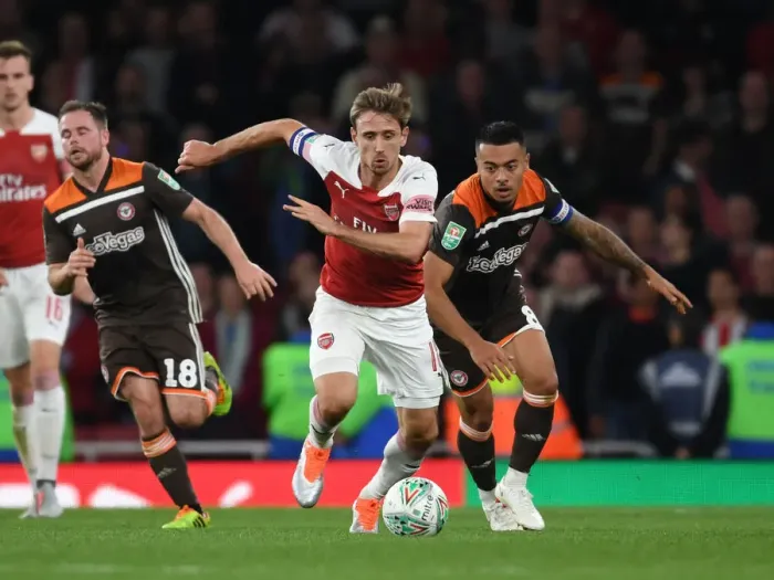 Framed Print : Monreal Overpowers Yennaris: Arsenal vs. Brentford in Carabao Cup Framed Print : Monreal Overpowers Yennaris: Arsenal vs. Brentford in Carabao Cup