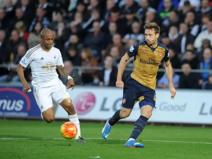 Framed Print : Monreal Under Siege: Ayew's Intense Pressure on Arsenal's Defender